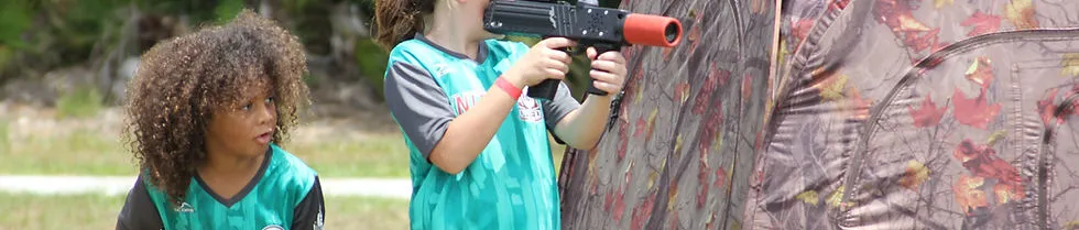 Players working through a mission-based field setup.